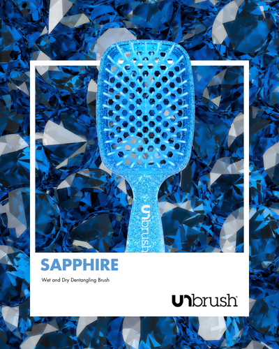 UNbrush Glitter Detangling Hair Brush in Sapphire Blue Polaroid Background