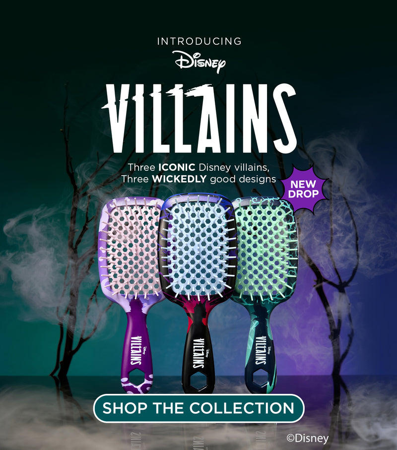 Promotional graphic for Disney Villains hairbrushes, showing three stylized hairbrushes with purple, red, and teal handles and bristles, set against a dark smoky background with large white text reading 'Villains' and a 'Shop the Collection' banner.