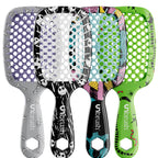 Four colorful hairbrushes with different patterns on a white background