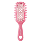 Pink hairbrush on a white background