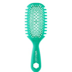Green hairbrush on a white background