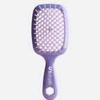 Dark purple Unbrush detangling brush with light purple hexagon bristle pattern, designed for gentle use on wet or dry hair.