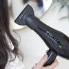 Professional 2000 Nano Power Blow Dryer Held By Model - Perspective View
