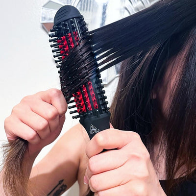 Ceramic Heated Hair Brush In Usage By Straight Hair Model